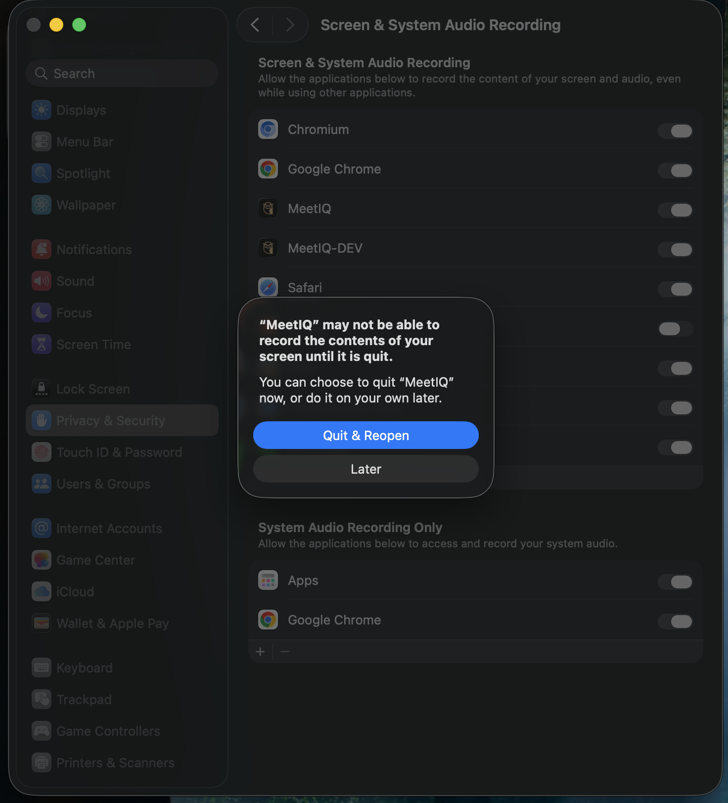 macOS prompting you to quit and reopen MeetIQ after granting permission.